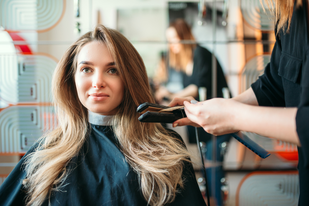 Hairstylist Straightens Hair, Hairdressing Salon